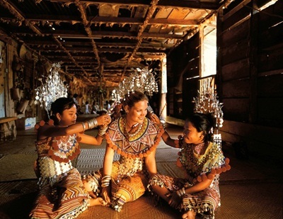 tourist dressed up with native