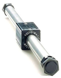 Magnetically coupled rodless pneumatic cylinder