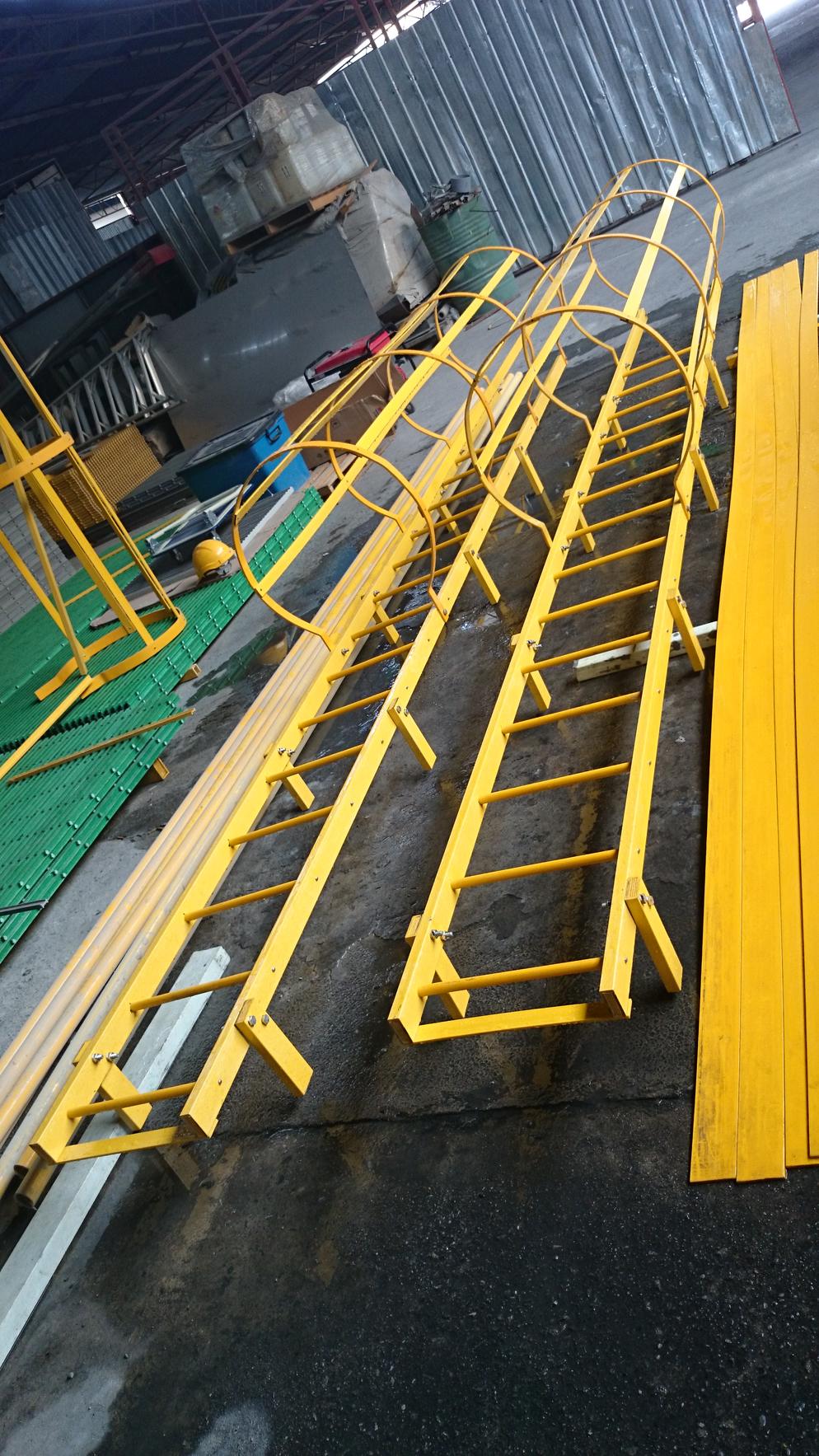 FRP ladder w safety cage