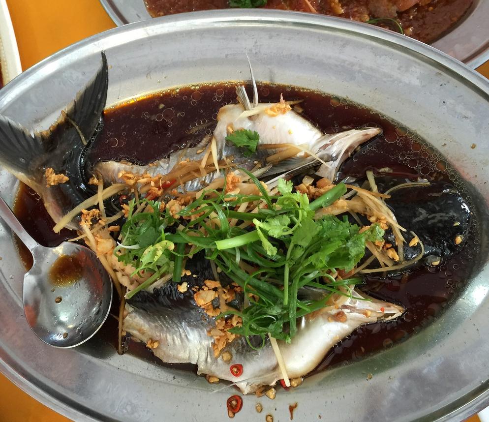 Patin Cooked with soysauce, topped with crisp-fried ginger