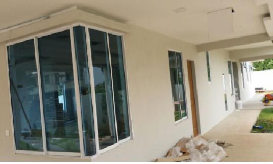 Extension of kitchen and car porch at Uni Garden, Samarahan